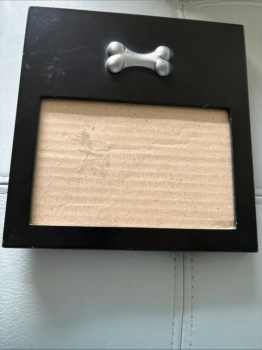 Black Wall Mirror with Silver Bone Accent